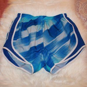 Blue Patterned Nike running shorts